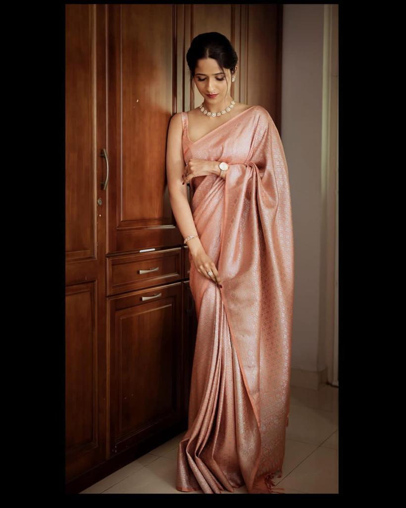 Preferable Peach Colored Printed Saree For Women