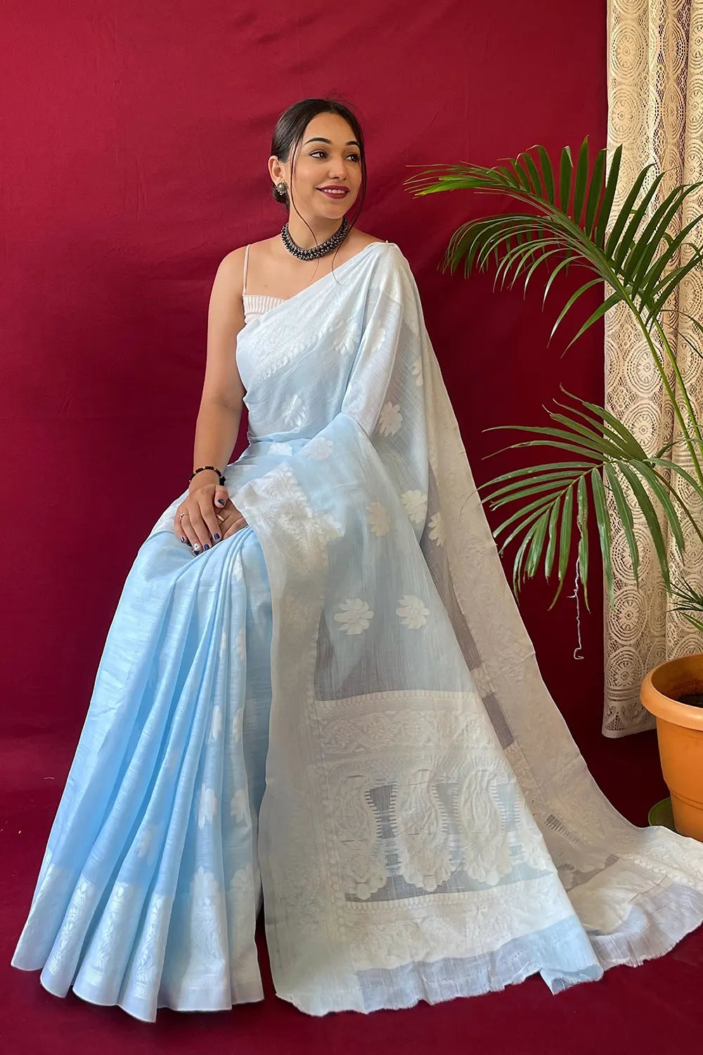 Majesty Pastel Blue Lucknowi Work Linen Saree