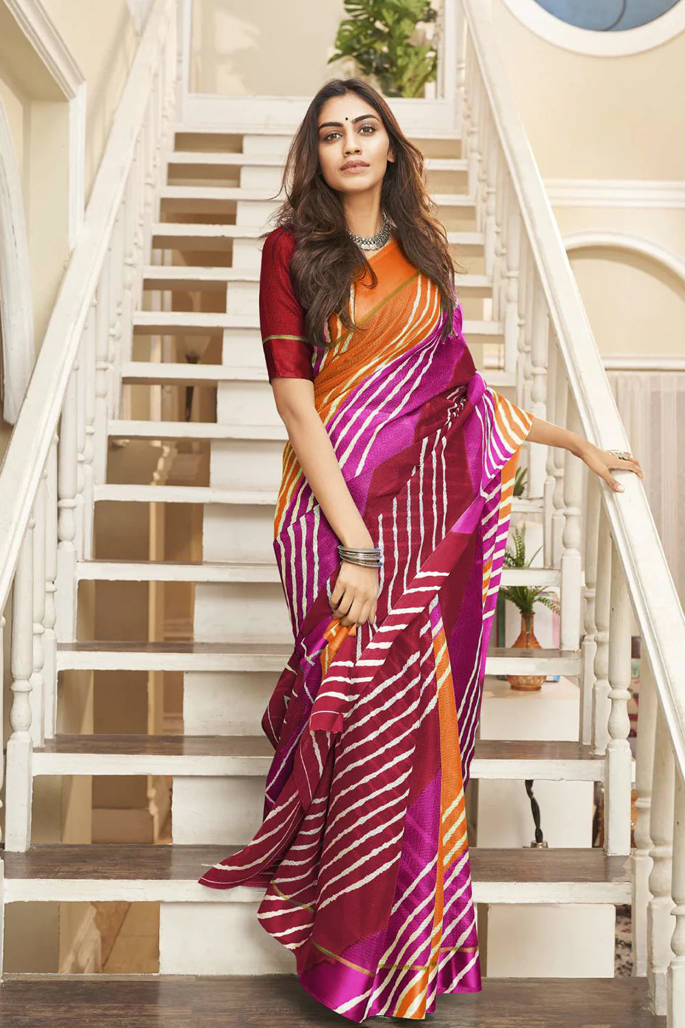 Sophisticated Maroon & Orange Leheriya Printed Soft Silk Saree