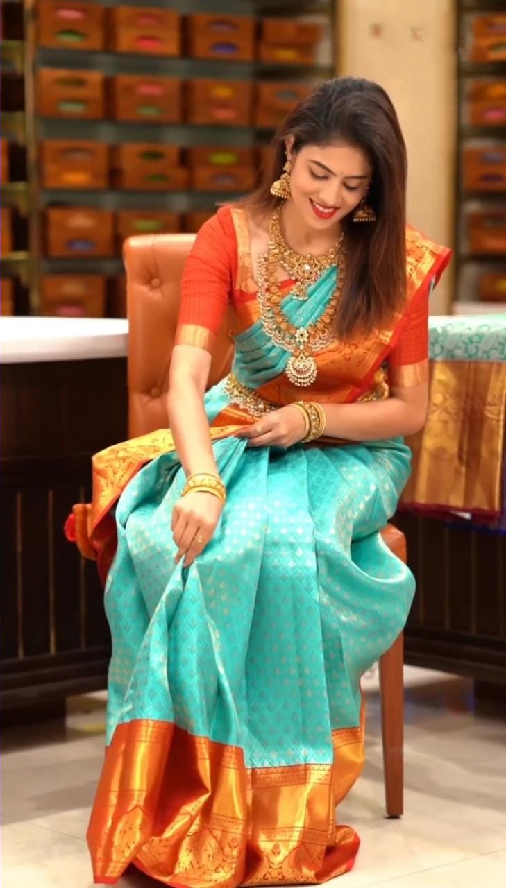 Groovy Turquoise Soft Silk Saree with Propinquity Blouse Piece