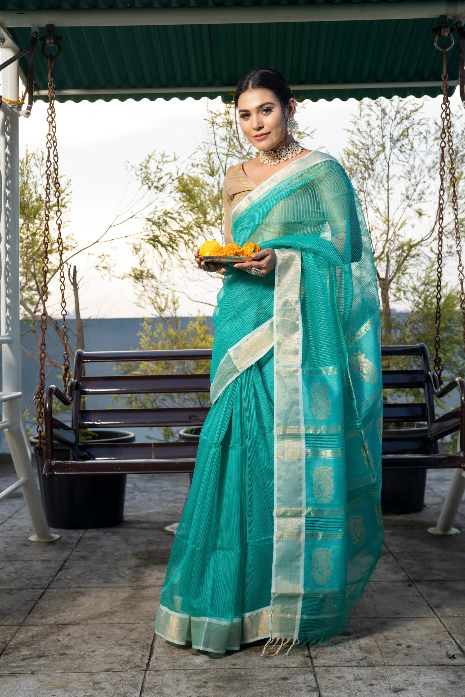 Impressive Rama Colored With Gold Border Partywear Printed Pure Linen saree