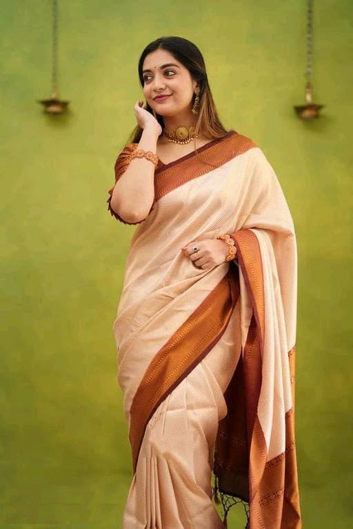 Intricate Light Peach Colored Printed Saree For Women