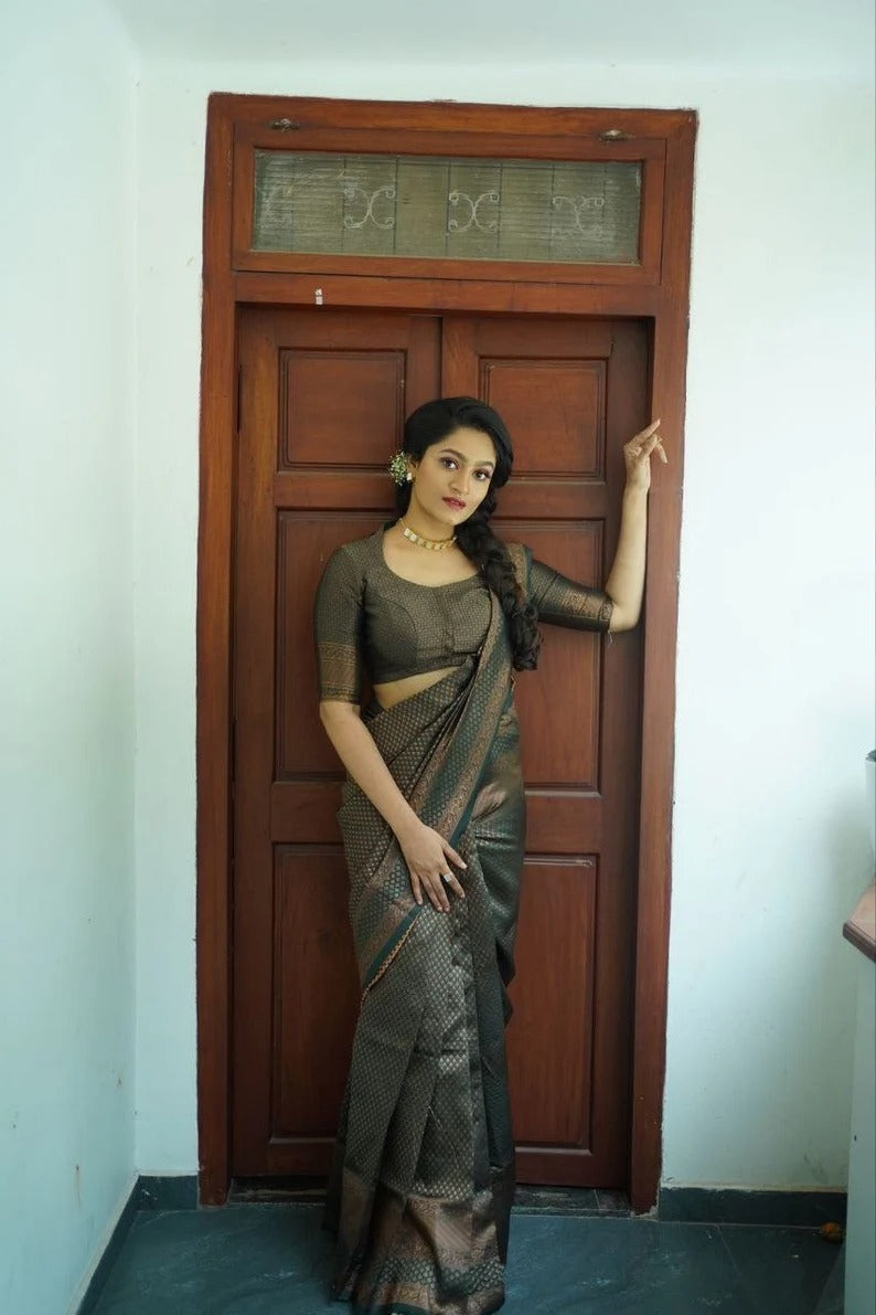 Prominent Rama Color Soft Silk Saree With Blouse Piece