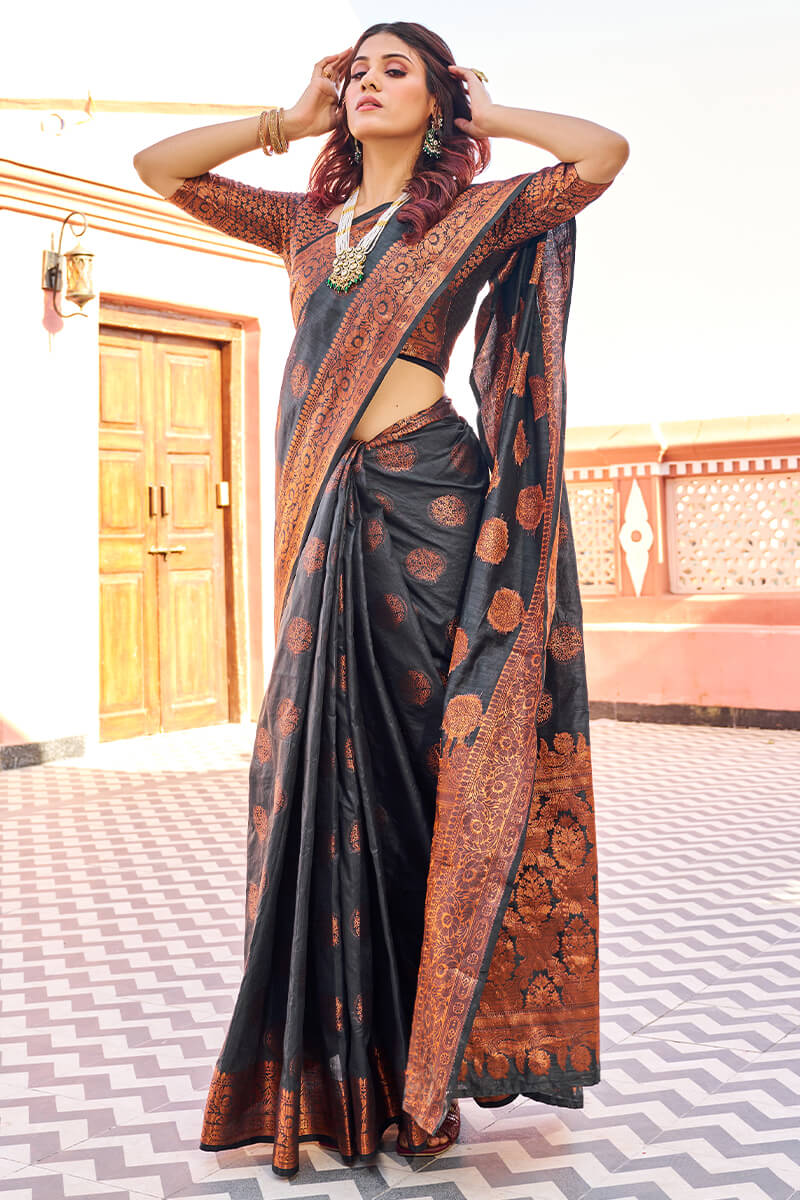 Demanding Black Banarasi Silk Saree With Pretty Blouse Piece