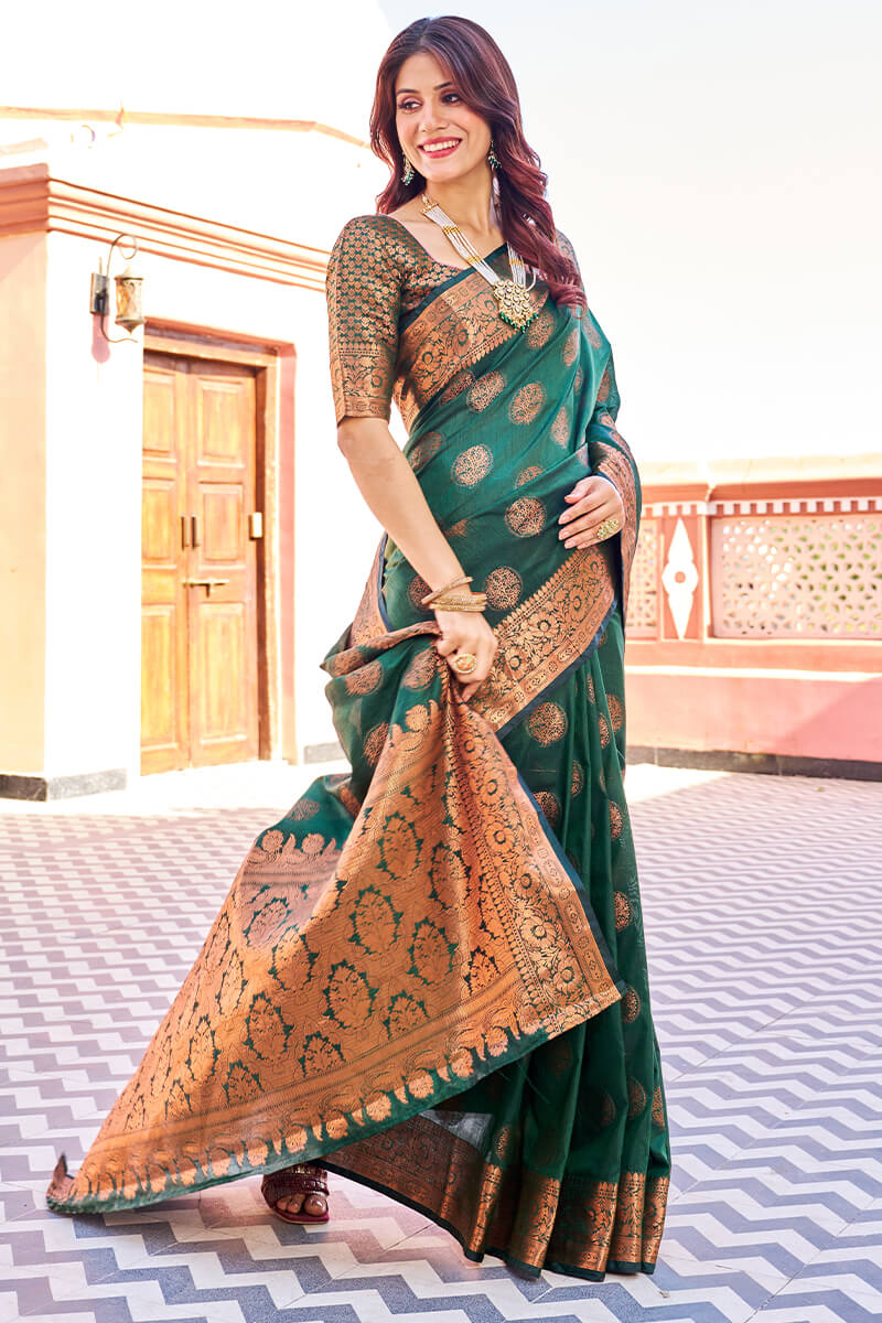 Blooming Dark Green Banarasi Silk Saree With Engrossing Blouse Piece