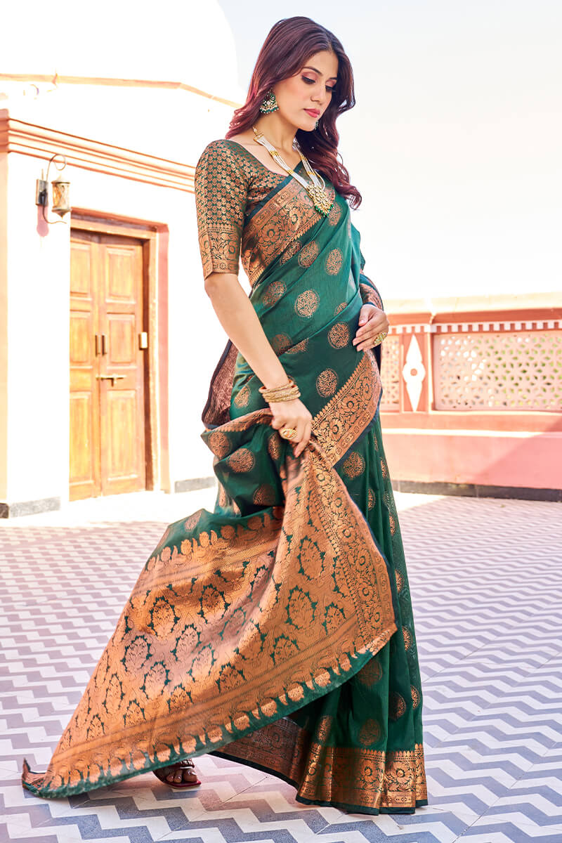 Blooming Dark Green Banarasi Silk Saree With Engrossing Blouse Piece