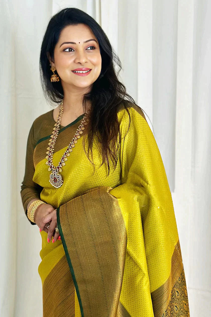 Snazzy Lemon Soft Silk Saree With Inspiring Blouse Piece