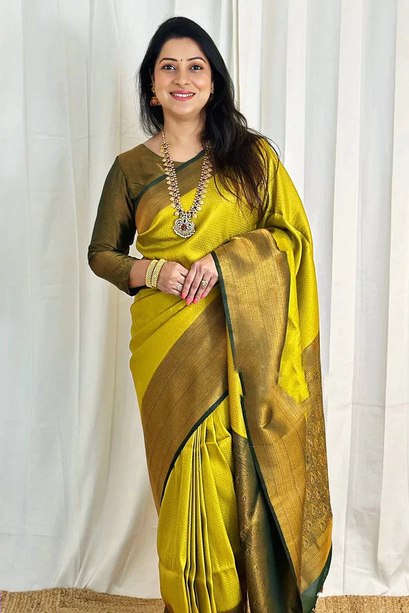 Snazzy Lemon Soft Silk Saree With Inspiring Blouse Piece